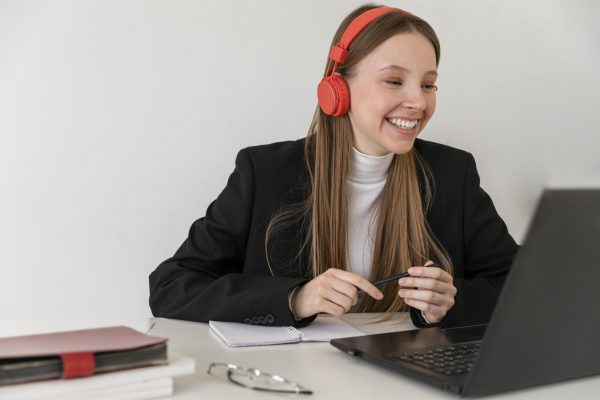 medium-shot-woman-working-with-laptop